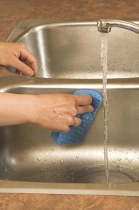 Washing the sink