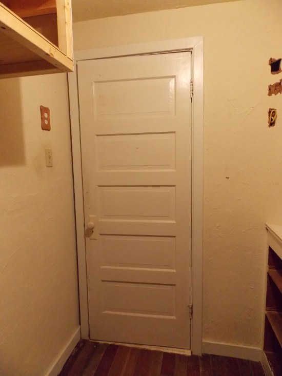 Laundry room door - before