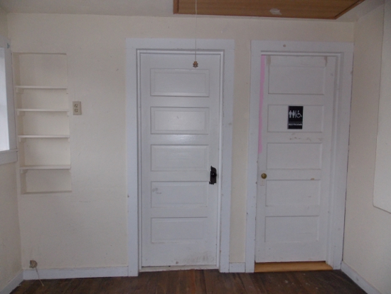 Doors to the bathroom & laundry room - before
