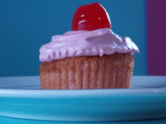 Cherry cupcake topped with Cool Whip Frosting