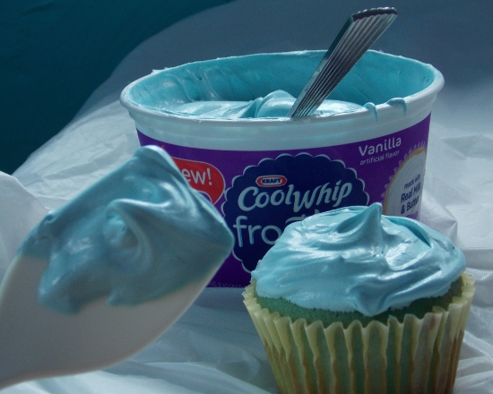 Topping cupcakes with Cool Whip Frosting